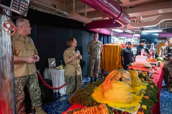 YOKOSUKA, Japan (Nov. 23, 2023) – Chief of Naval Operations Adm. Lisa Franchetti and Master Chief Petty Officer of the Navy James Honea give remarks before serving Thanksgiving dinner to Sailors aboard the U.S. Navy's only forward-deployed aircraft carrier USS Ronald Reagan (CVN 76), Nov. 23. Franchetti and Honea visited Reagan and other 7th Fleet commands to engage with Sailors and Navy leadership to highlight Franchetti's priority of strengthening the Navy team. (U.S. Navy photo by Chief Mass Communication Specialist Amanda R. Gray)