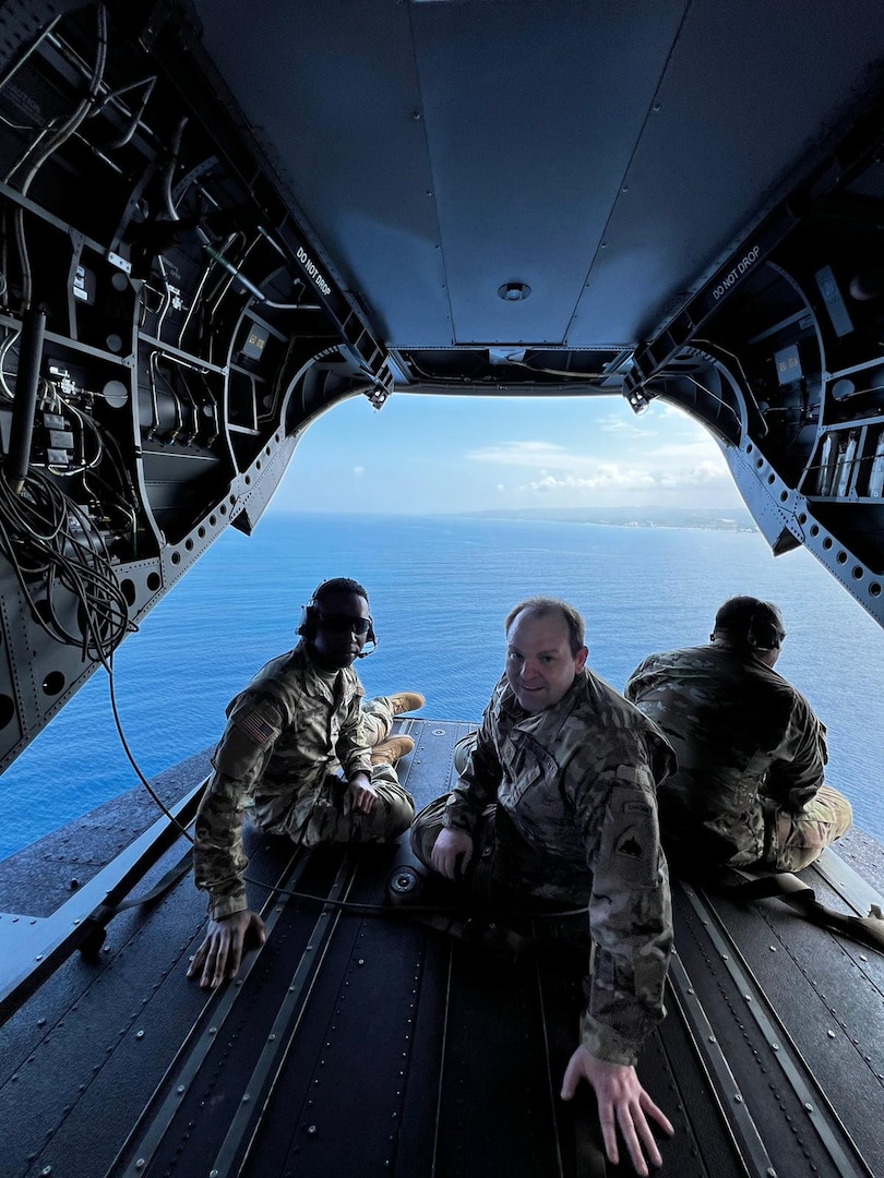 U.S. Army Capt. Michael Humphrise and U.S. Army Maj. Bill Seskey receive an island tour of Jamaica by plane Feb. 21, 2024. Members of the District of Columbia Army National Guard joined forces with elite U.S. and Canadian Special Operations Forces for a subject matter expert exchange.