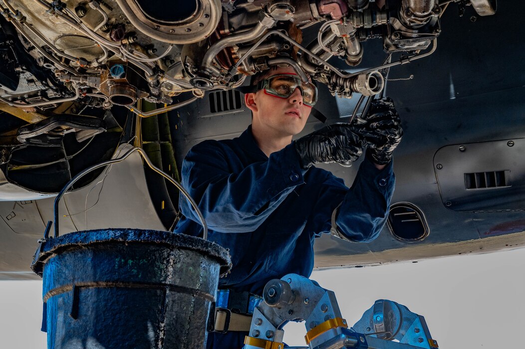 Airman 1st Class Coen Rader, 2nd Aircraft Maintenance Squadron aerospace propulsion apprentice, performs pre-flight maintenance
