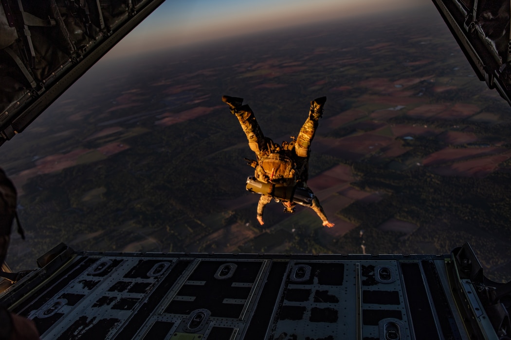 An Airman assigned to the 38th Rescue Squadron performs a military free fall jump