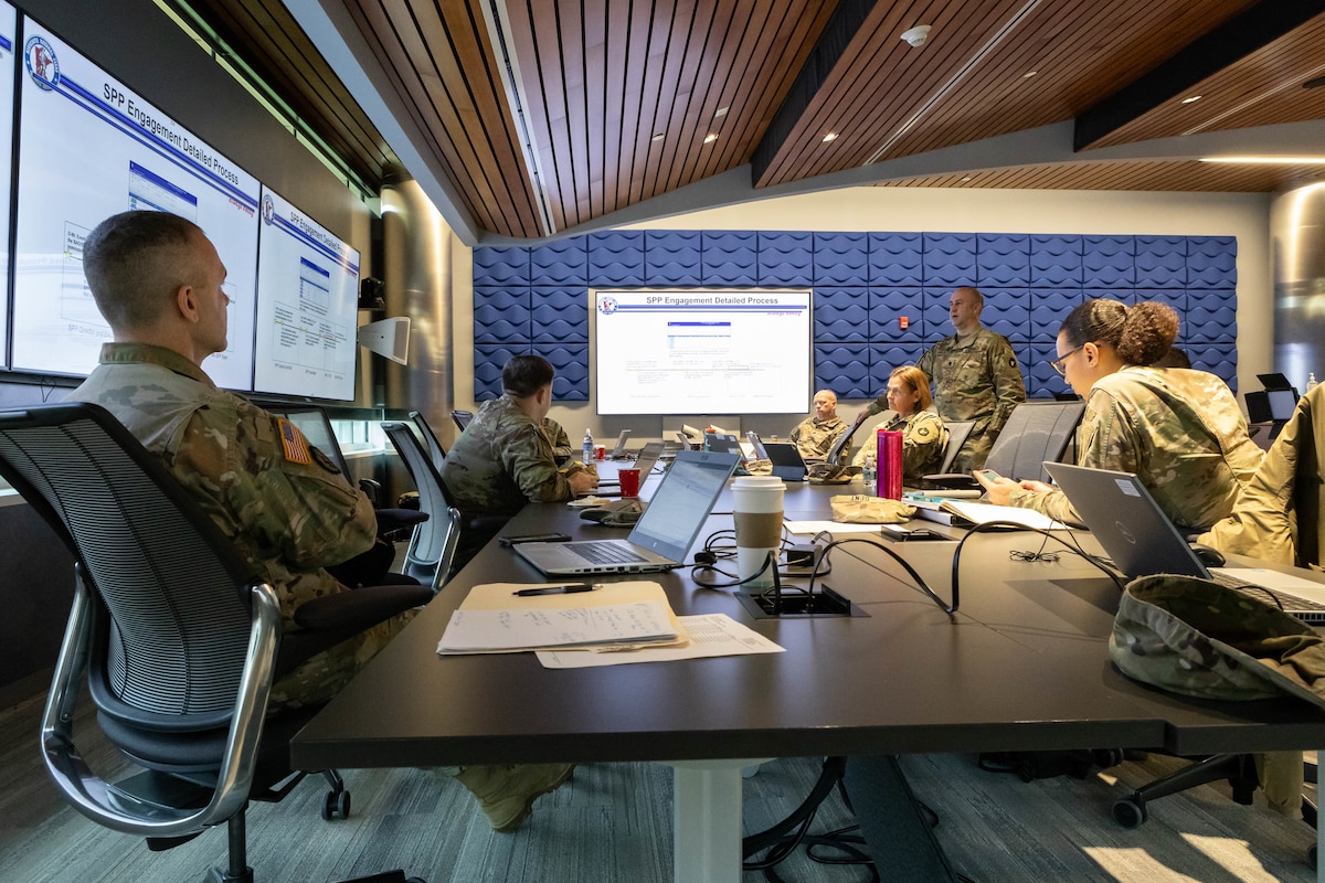 U.S. Army and Air National Guard members of the State Partnership Program discuss plans to integrate efforts with Adriatic partner nations at the National Aerospace Research and Technology Park, Egg Harbor Township, New Jersey, Jan. 24, 2024. By linking U.S. states with partner countries, the SPP enhances military capabilities and interoperability.