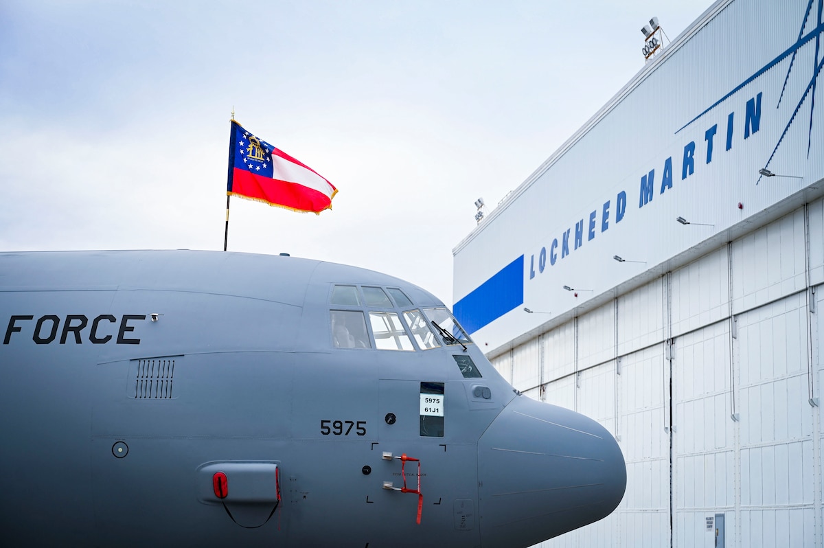 The 165th Airlift Wing, Georgia Air National Guard's first C-130J Super Hercules, tail number 5975, is staged in front of a Lockheed Martin hangar in Marietta, Ga., Jan. 22, 2024, for a delivery ceremony display. The 165 AW received the first of its eight C-130J-30 Super Hercules tactical airlift aircraft during a ceremony commemorating a new era in Hercules operations for the wing.