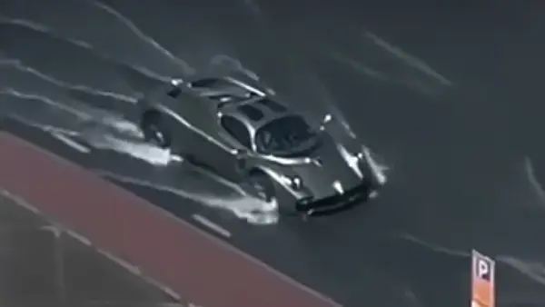 $6 million supercar filmed driving through floodwater 