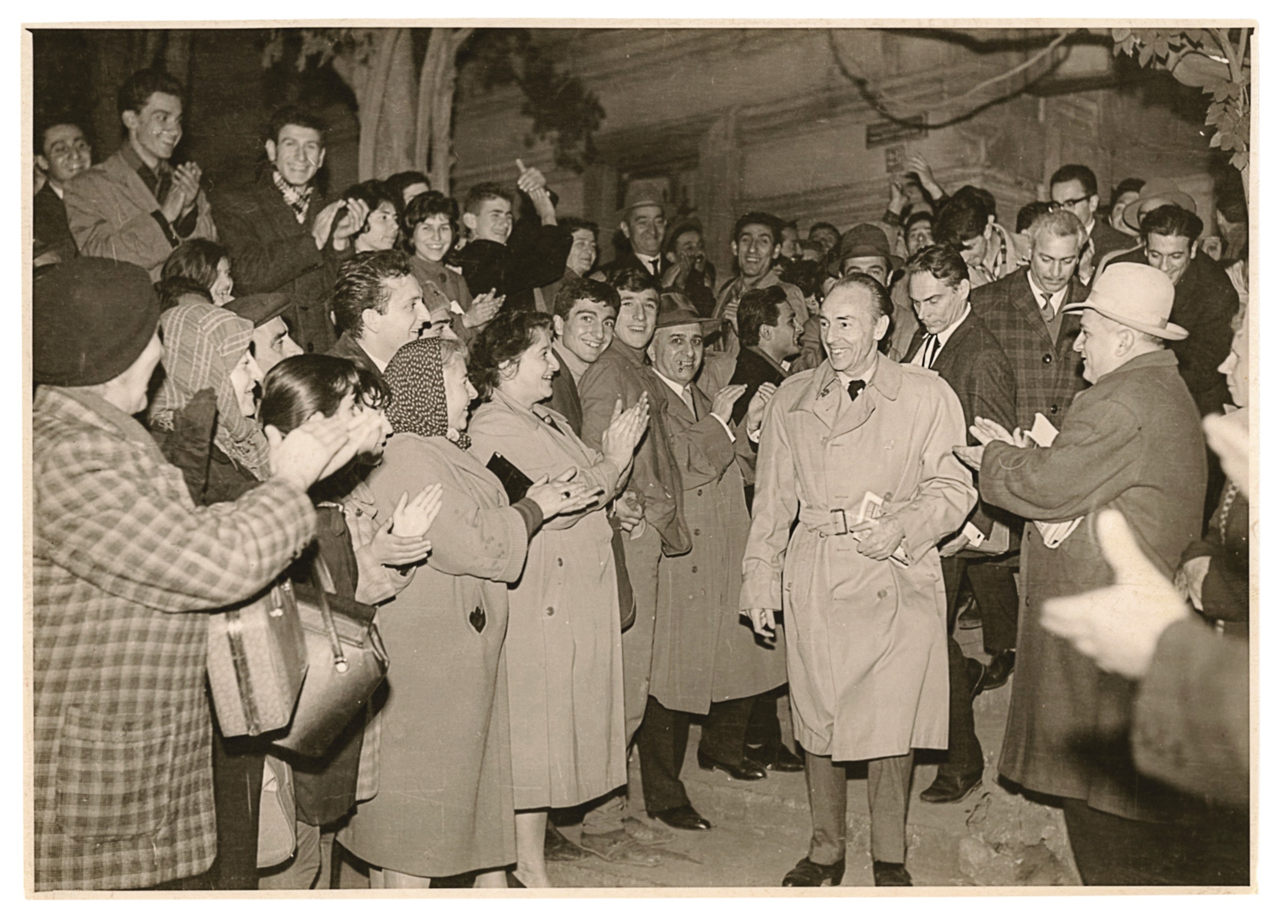 Crowd in Tbilisi parts as Balanchine enters the theater for a performance.