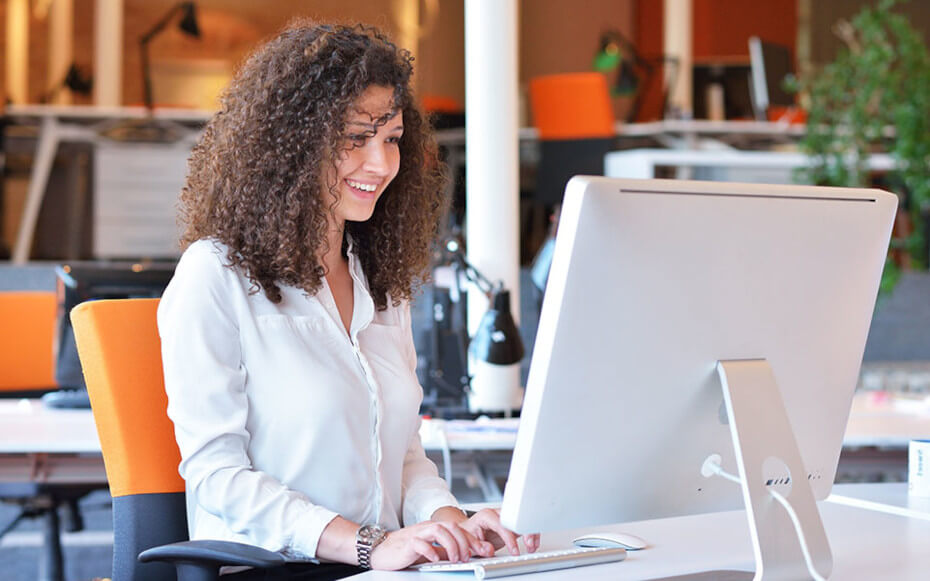 Woman working at a computer