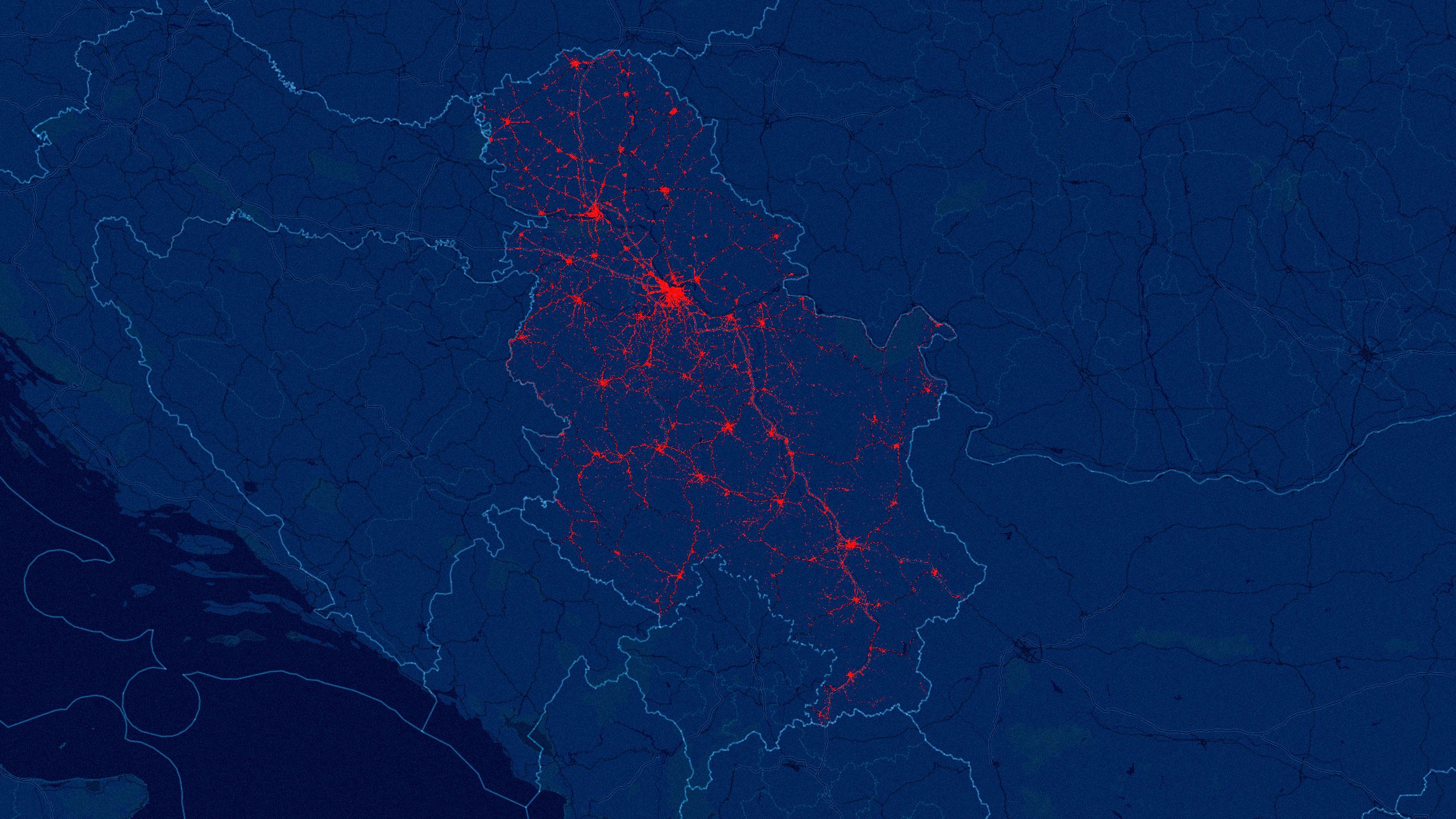 Mapa Srbije sa prikazanim svim saobraćajnim nezgodama, tamnoplava pozadina i sitne crvene tačke. Svaka crvena tačka je jedna saobraćajna nesreća. Nalik je na  prikaz krvotoka. Otud naslov: Saobraćajni krvotok Srbije.