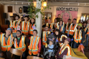 Volunteers gather at Manny's before heading out to collect trash. 