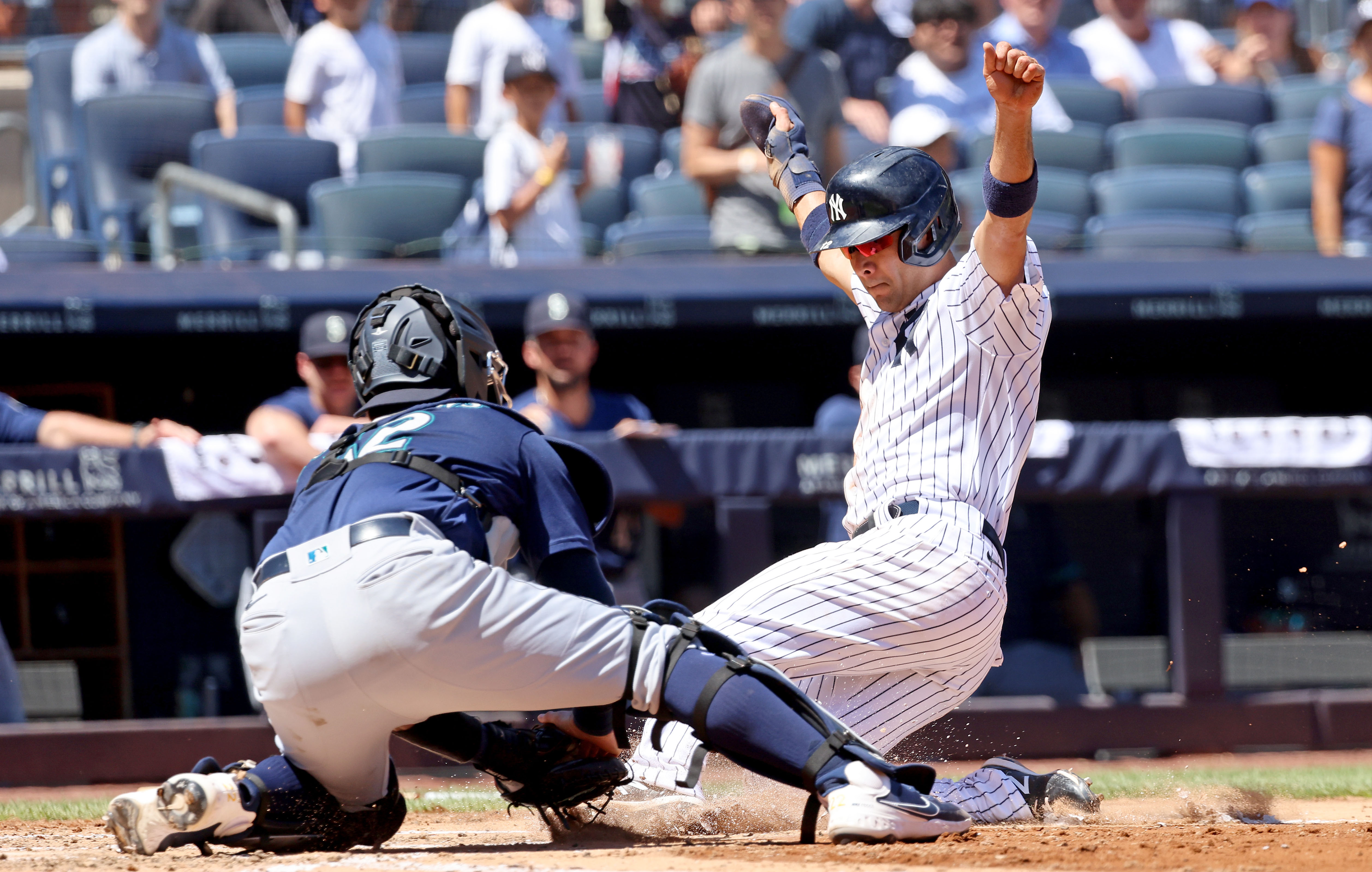 Isiah Kiner-Falefa was thrown out at home while trying to score from first base on a double by Kyle Higashioka to end the second inning in the Yankees' 7-3 loss to the Mariners.