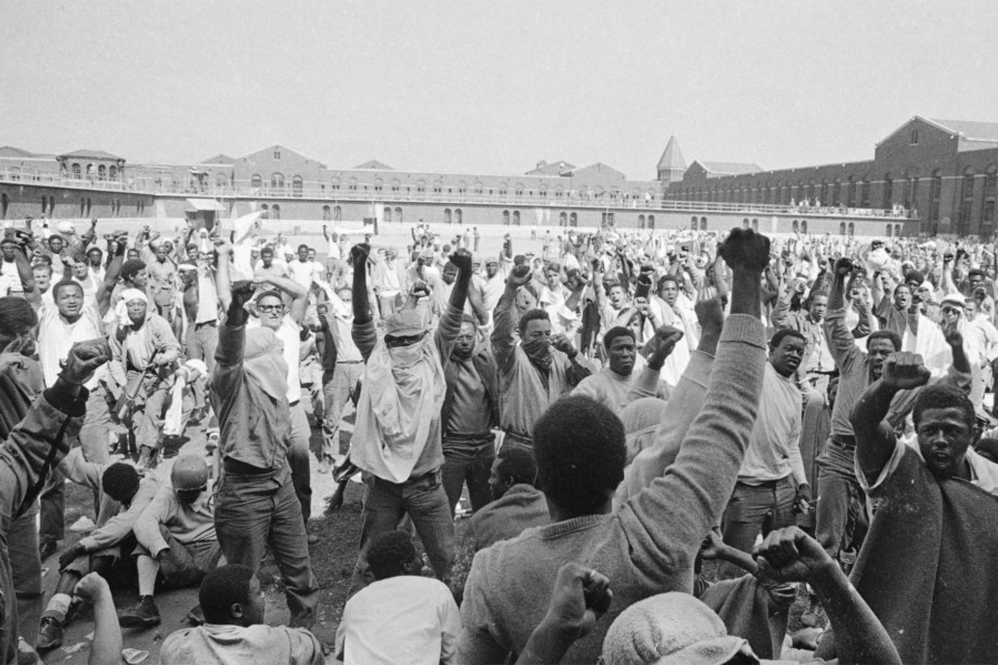 Inmates at Attica State Prison in Attica, N.Y., raise their hands in clenched fists in a show of unity, Sept. 1971, during the Attica uprising, which took the lives of 43 people. New York authorities have lifted a ban that had stopped state prison inmates from reading a book about the 1971 Attica Correctional Facility uprising following a First Amendment lawsuit brought by its author. (AP Photo, File)