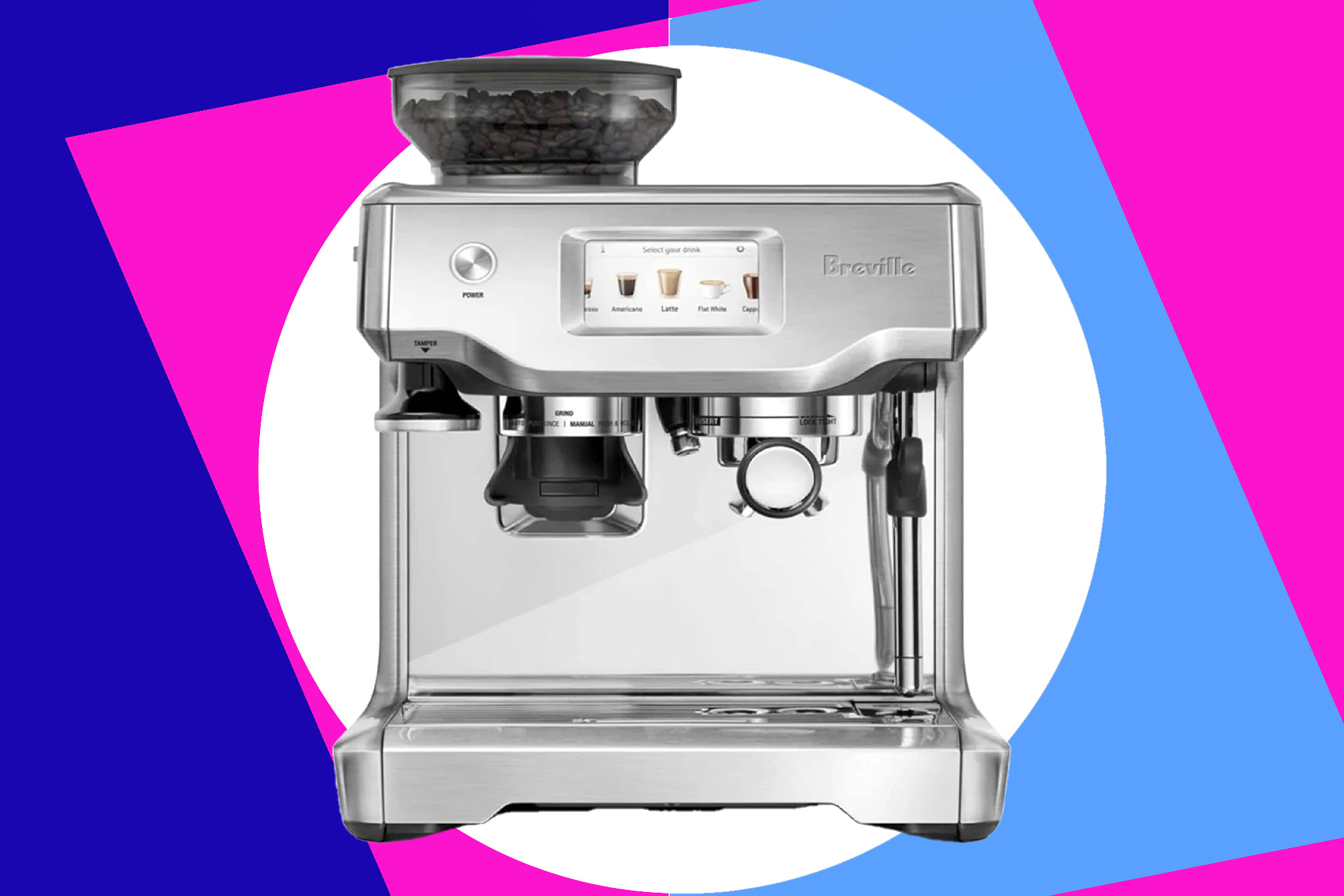 a silver coffee machine with a bowl of coffee beans