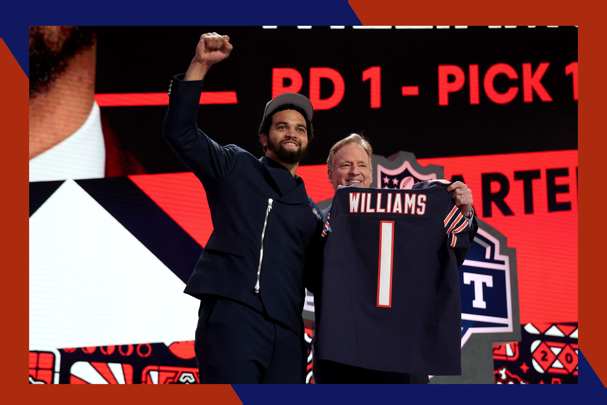 Chicago Bears quarterback Caleb Williams (L) raises his fist next to NFL Commissioner Roger Goodell after being selected with the number one pick at the 2024 NFL Draft.