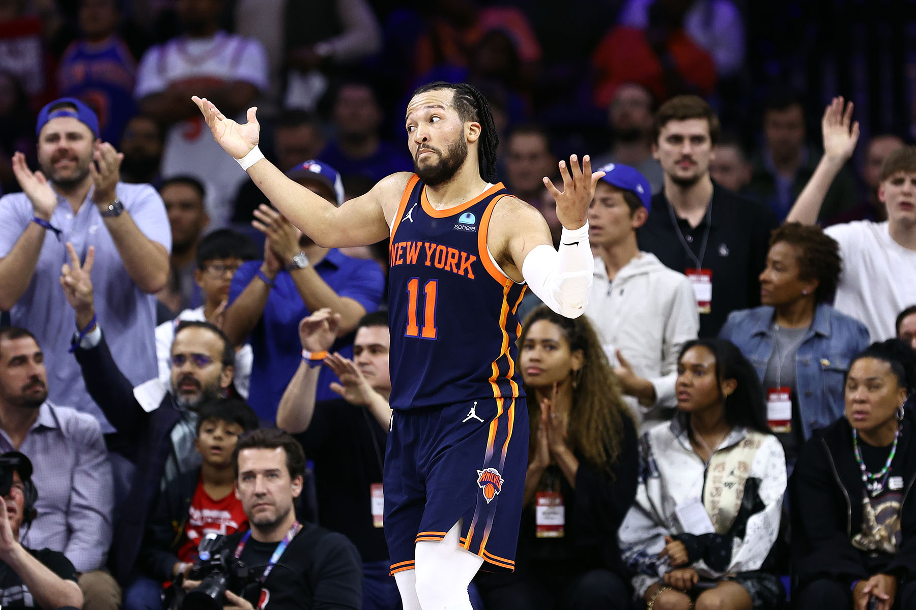 Jalen Brunson #11 of the New York Knicks reacts during the fourth quarter against the Philadelphia 76ers during game four of the Eastern Conference First Round Playoffs at the Wells Fargo Center on April 28, 2024 in Philadelphia, Pennsylvania.