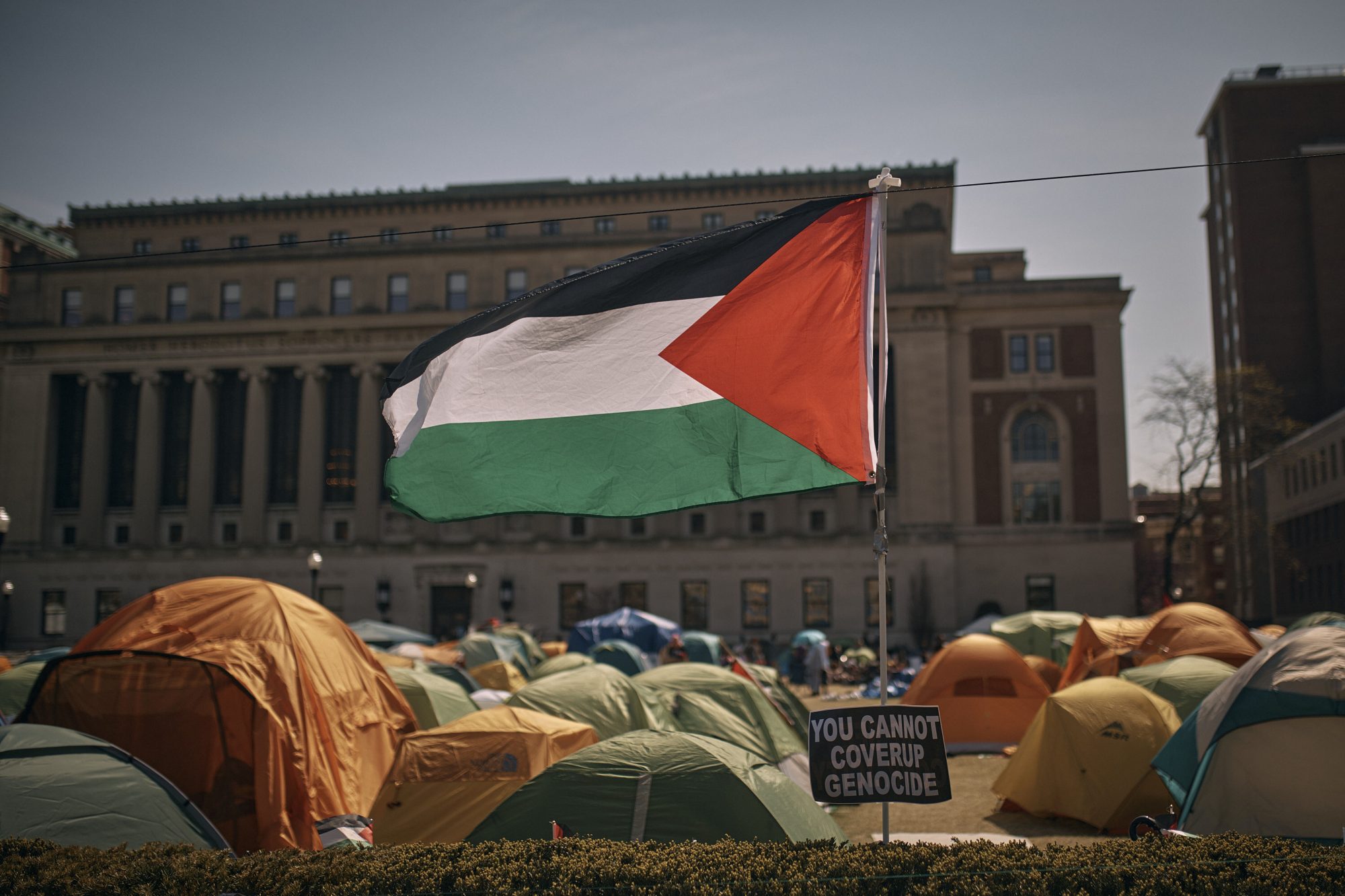 A Palestinian flag flutters in the wind during a pro-Palestinian encampment,