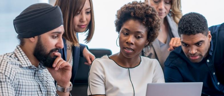 Racially diverse group in meeting