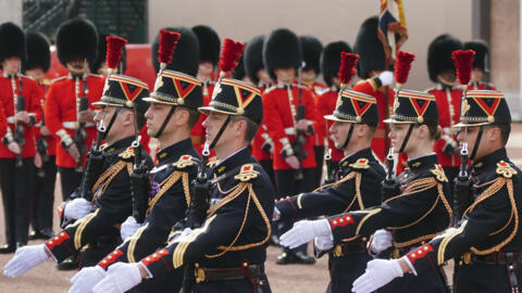 Troops from France's 1er Regiment de le Garde Republicaine partake in the Changing of the Guard ceremony at Buckingham Palace, to commemorate the 120th anniversary of the Entente Cordiale.