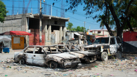 Charred vehicles are abandoned in an empty parking lot as gang violence escalates in Port-au-Prince, Haiti, on March 9, 2024. 