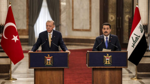 Iraq's Prime Minister Mohammed Shia al-Sudani (R) and Turkey's President Recep Tayyip Erdogan give a joint statement to the media in Baghdad on April 22, 2024.