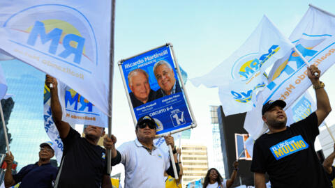 Supporters of presidential candidate José Raul Mulino of the Realizando Metas party at a rally in Panama City, May 2, 2024.
