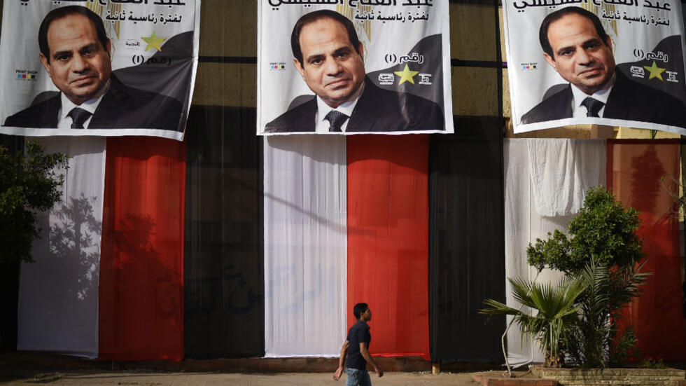 Affiches de campagne du président Abdel Fattah Al-Sissi, au Caire, le 25 mars 2018.