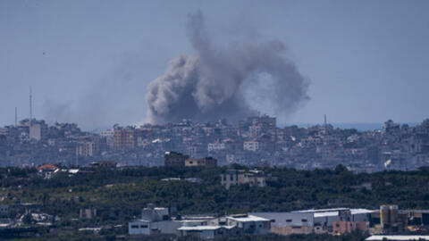 An explosion rises in the northern Gaza Strip, as seen from southern Israel, March 26, 2024.