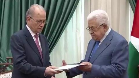 الرئيس الفلسطيني محمود عباس ورئيس الوزراء المكلف محمد مصطفى.