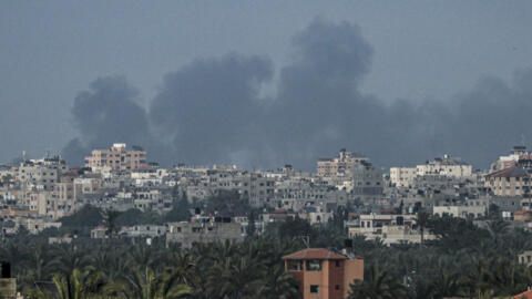 Smoke billows following Israeli bombardment north of Nuseirat in the central Gaza Strip on April 27, 2024.