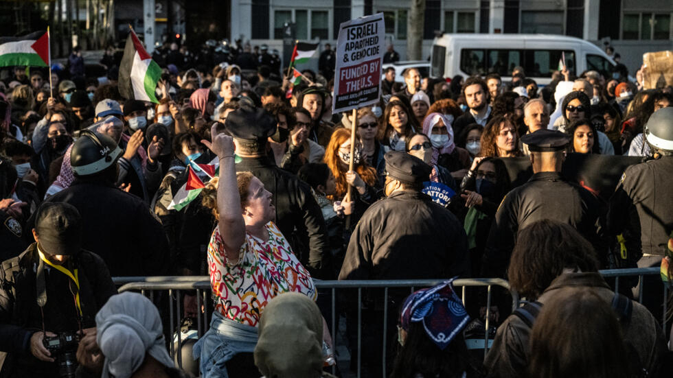 NEW YORK, NEW YORK - APRIL 26: New York University students set up an encampment in solidarity with Gaza as police stand guard on April 26, 2024 in New York City. A previous encampment was dismantled