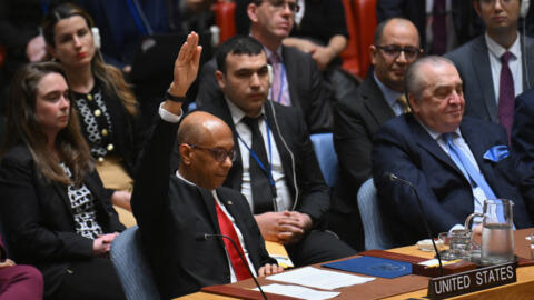 US Deputy Ambassador to the UN Robert Wood votes against a resolution allowing Palestinian UN membership at United Nations headquarters in New York, on April 18, 2024, during a United Nations Security