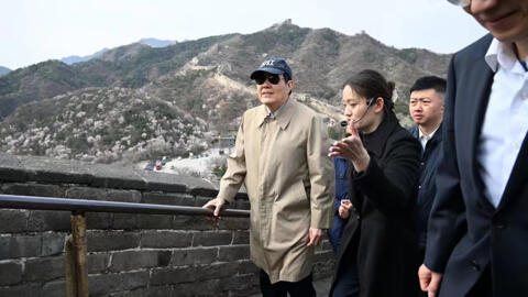 Taiwan's former president Ma Ying-jeou (left,wearing cap) visiting the Great Wall of China in the outskirts of Beijing.