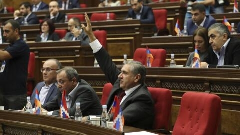 Armenian lawmakers are seen attending a session of the National Assembly of the Republic of Armenia in Yerevan on October 3, 2023.