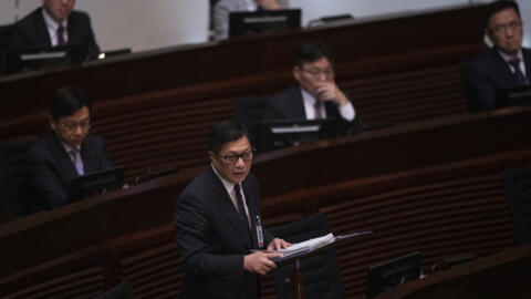 Secretary for Security Chris Tang addresses the Legislative Council in Hong Kong on March 19, 2024.