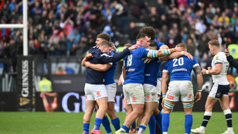 Italy celebrate after beating Scotland in the Six Nations in Rome.