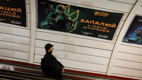 A banner advertising an appeal to join the 3rd Separate Assault Brigade of the Ukrainian Armed Forces is seen at a metro station in Kyiv, Ukraine on April 23, 2024.