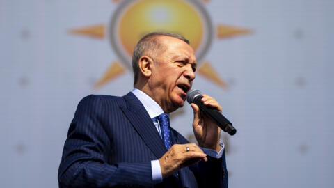 Turkish President and leader of the Justice and Development Party, or AKP, Recep Tayyip Erdogan gives a speech during a campaign rally ahead of nationwide municipality elections, in Istanbul, Turkey,