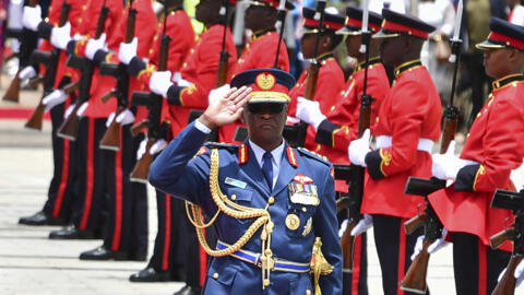 Chief of Kenya Defence Forces General Francis Ogolla (C) gestures at the tomb of the Unknown Warrior during a wreath laying ceremony at Uhuru Gardens in Nairobi on October 31, 2023.