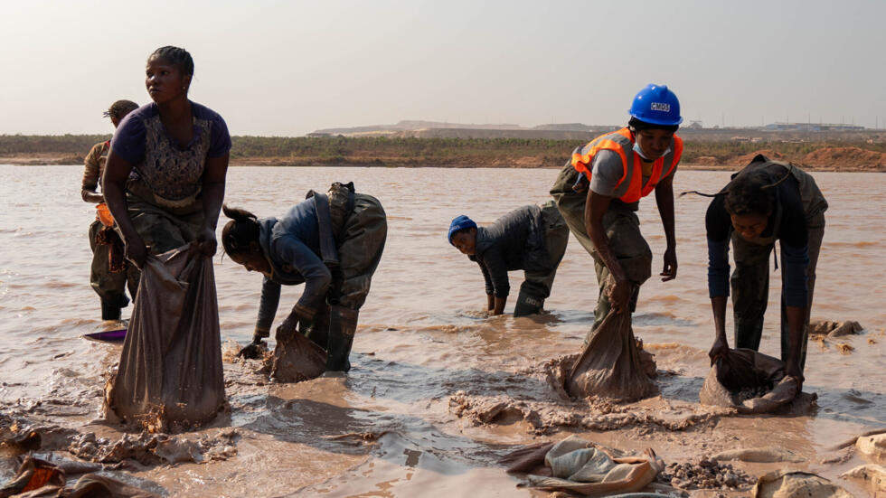 Women wash ore in the copper-cobalt mine of Kamilombe, in the south-eastern Democratic Republic of Congo, in June 2023. The DRC produces over 70 percent of the global supply of cobalt, a critical component of batteries. 