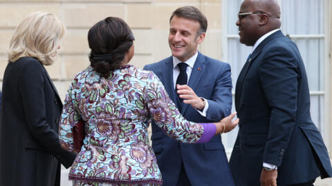 France's President Emmanuel Macron greets President of the Democratic Republic of the Congo Felix Tshisekedi and his wife Denise Nyakzru Tshisekedi prior to a working lunch at the Elysee Palace, in Paris on 30 April 2024.