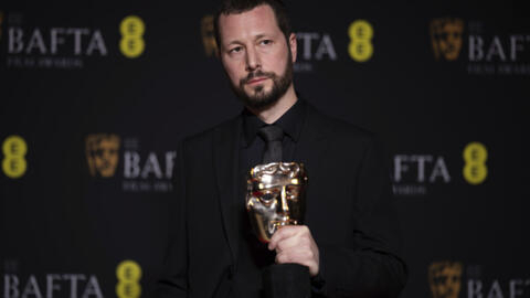 Director, producer and Associated Press journalist Mstyslav Chernov, winner of the documentary award for '20 Days in Mariupol', poses for photographers at the 77th British Academy Film Awards, BAFTA's