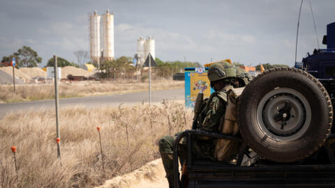 Soldiers patrol near the TotalEnergies complex in Afungi, near Palma in northern Mozambique, on 22 September 2021.