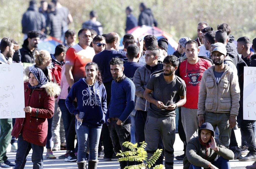 A group of migrants attempting to cross into Croatia gather near the Maljevac border crossing, Bosnia and Herzegovina. Credit: EPA/FEHIM DEMIR
