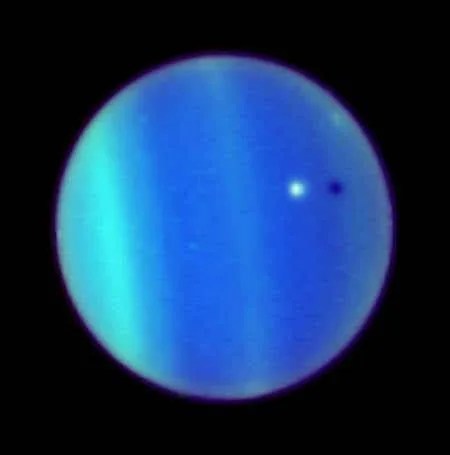 Uranus_from_hubble_with_ariel_transit_2006