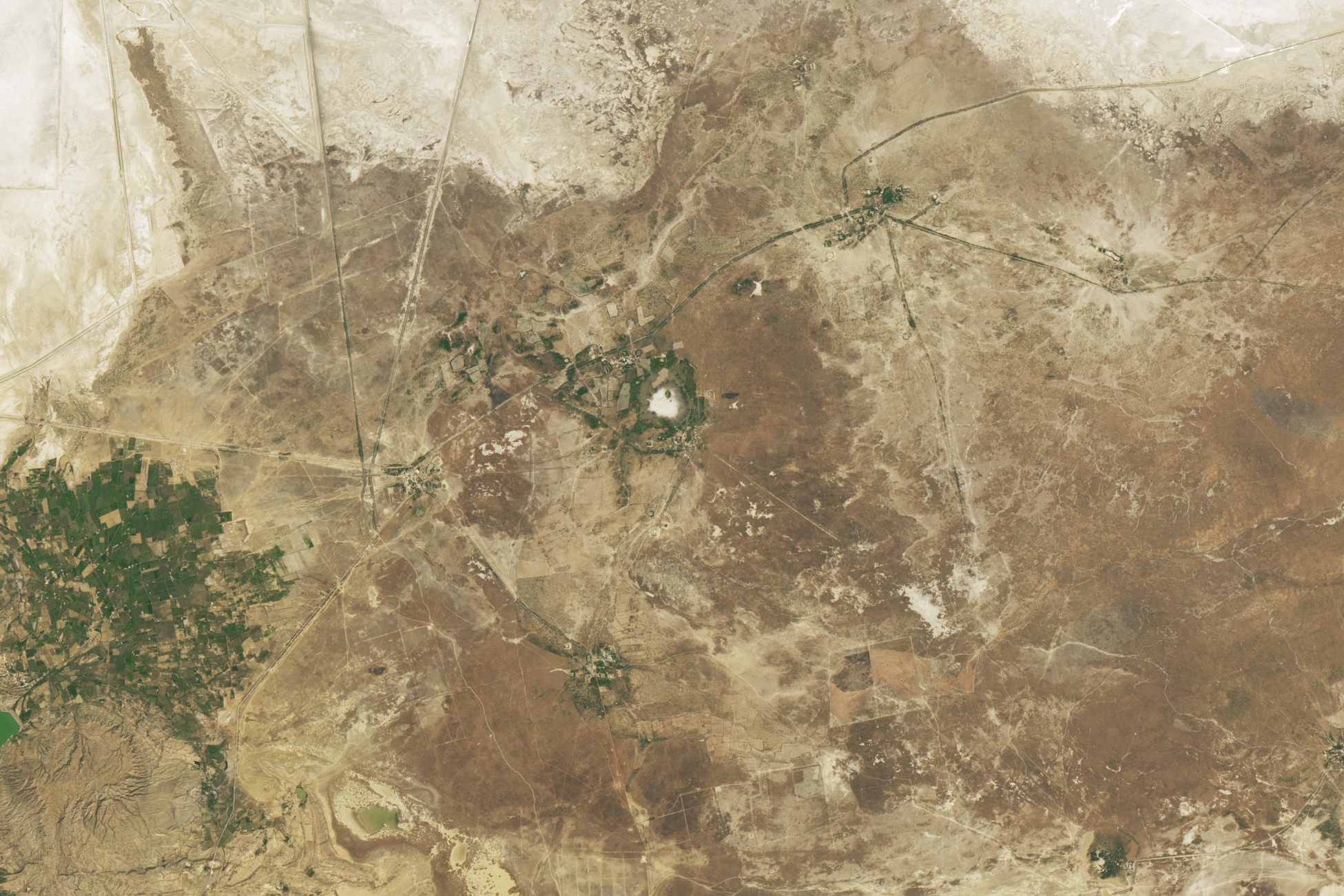 The footprint of the newly studied Luna impact crater—named for its proximity to a village of the same name—is visible in this image, acquired by the OLI (Operational Land Imager) on the Landsat 8 satellite on February 24, 2024. The crater measures approximately 1.8 kilometers (1.1 miles) across, and its outer rim rises about 6 meters (20 feet) above the crater floor.