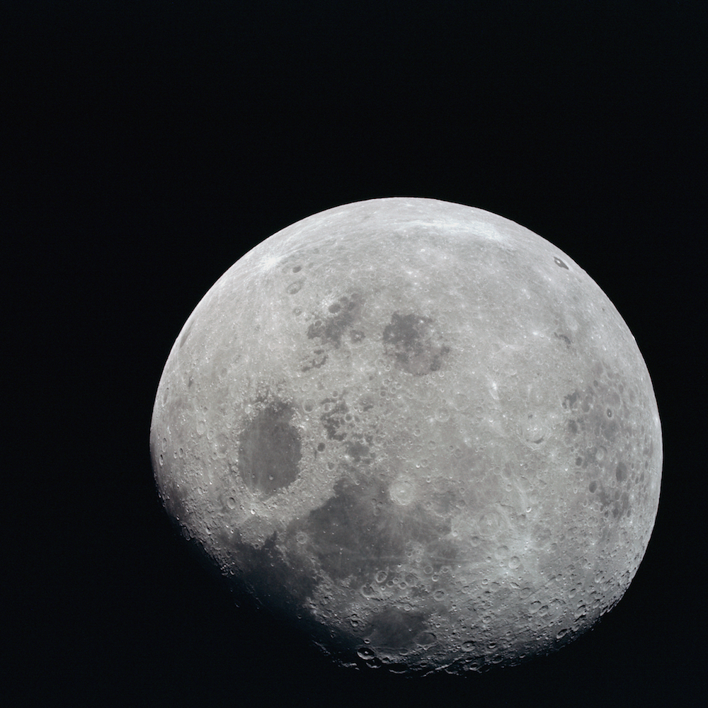 nearly full moon, with some far side features visible