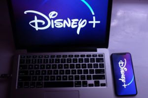 Disney+ on laptop and phone