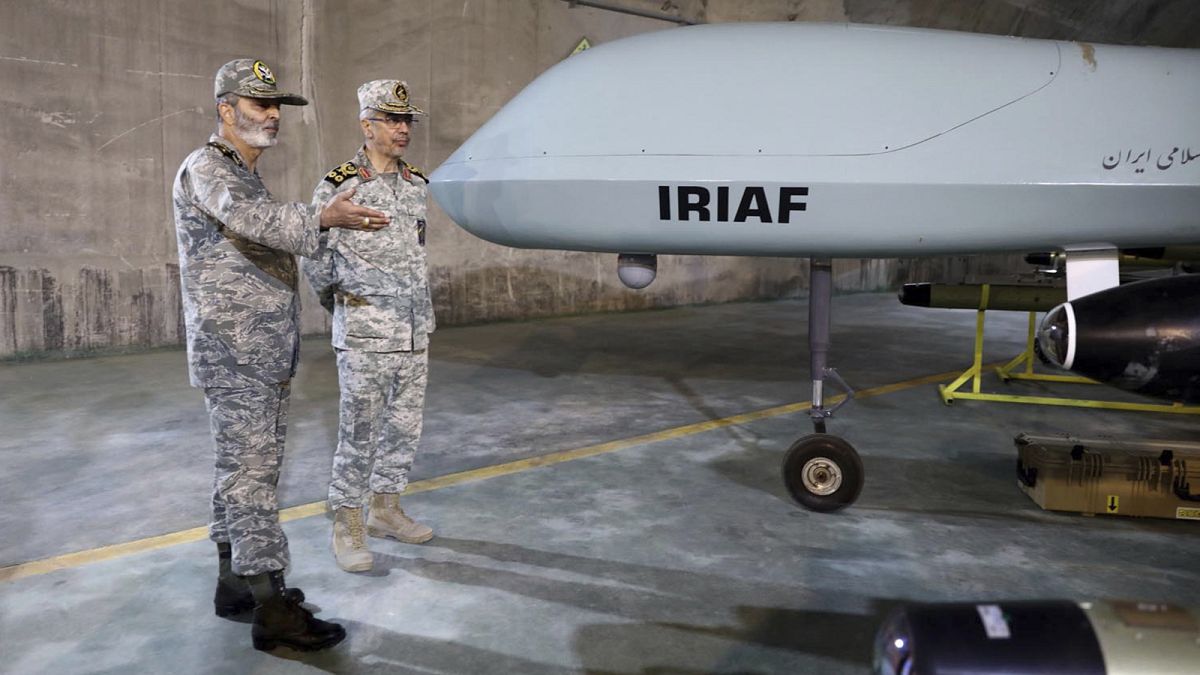 Top Iranian military officials Gen. Mohammad Hossein Bagheri and Gen. Abdolrahim Mousavi visit an underground drone base tunnel in western Zagros Mountain on 29 May 2022