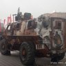 A blast-damaged Bushmaster vehicles in Moscow in a display from the Kremlin of its trophies seized on the Ukrainian battlefields.