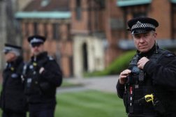 Police officers stand on duty at Windsor Castle in Windsor, Britain, April 1, 2018. Picture taken April 1, 2018. (Reuters)
