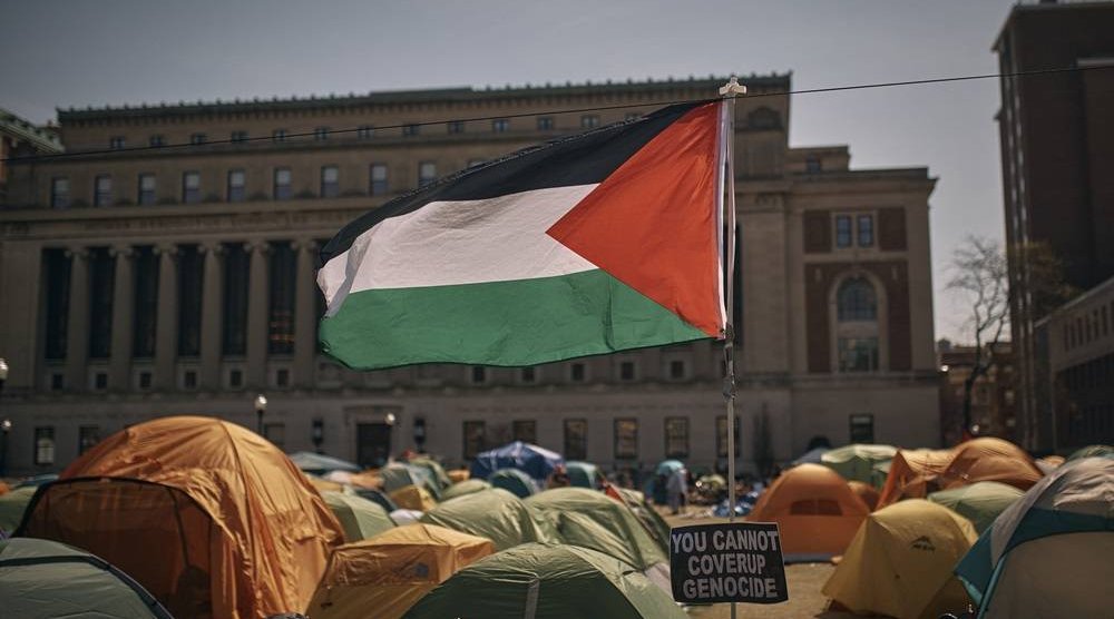  A Palestinian flag flutters in the wind during a pro-Palestinian encampment, advocating for financial disclosure and divestment from all companies tied to Israel and calling for a permanent cease-fire in Gaza, inside Columbia University Campus on Sunday, April 28, 2024, in New York. (AP)