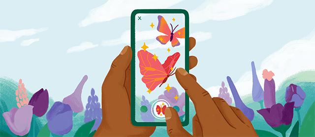 A hand holding a mobile phone applies a butterfly Instagram filter to a photo of a flower garden.