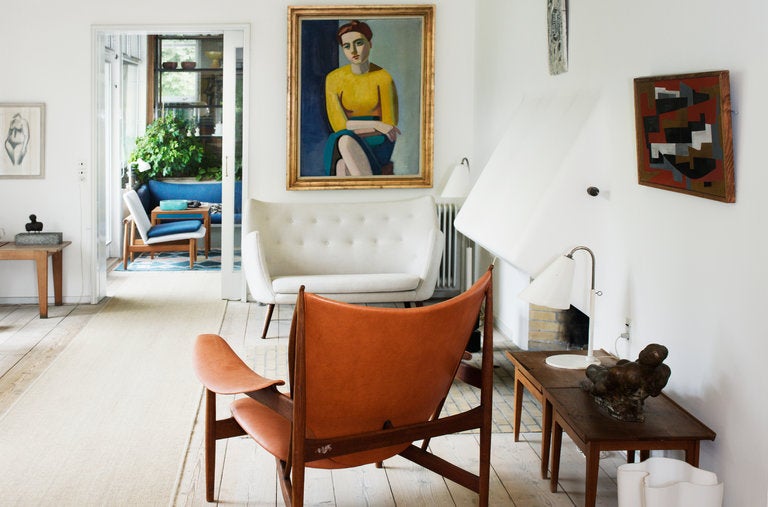 Finn Juhl’s living room in Charlottenlund, Denmark, with a Hovdingestole chair and Vilhelm Lundstrom’s “Portrait of Hanne Wilhelm Hansen” (1946), photographed in 2013.